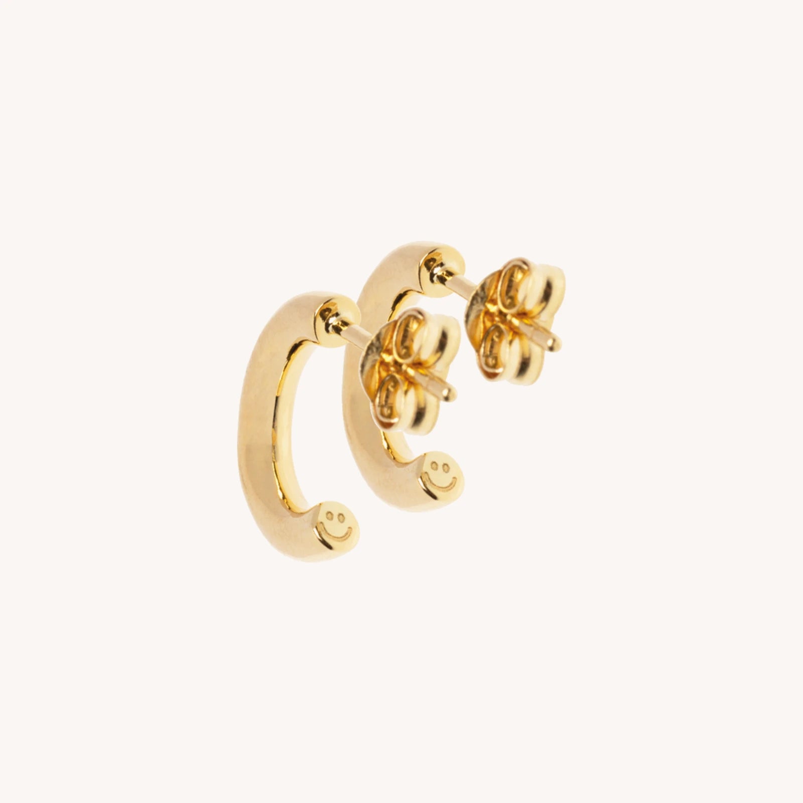 Happy Hoops earrings in 18k recycled solid gold with engraved smiley by All About Articus, detail view